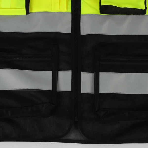 Breakaway high visibility vest with quick-release snaps. Ideal for emergency responders and industrial workers
