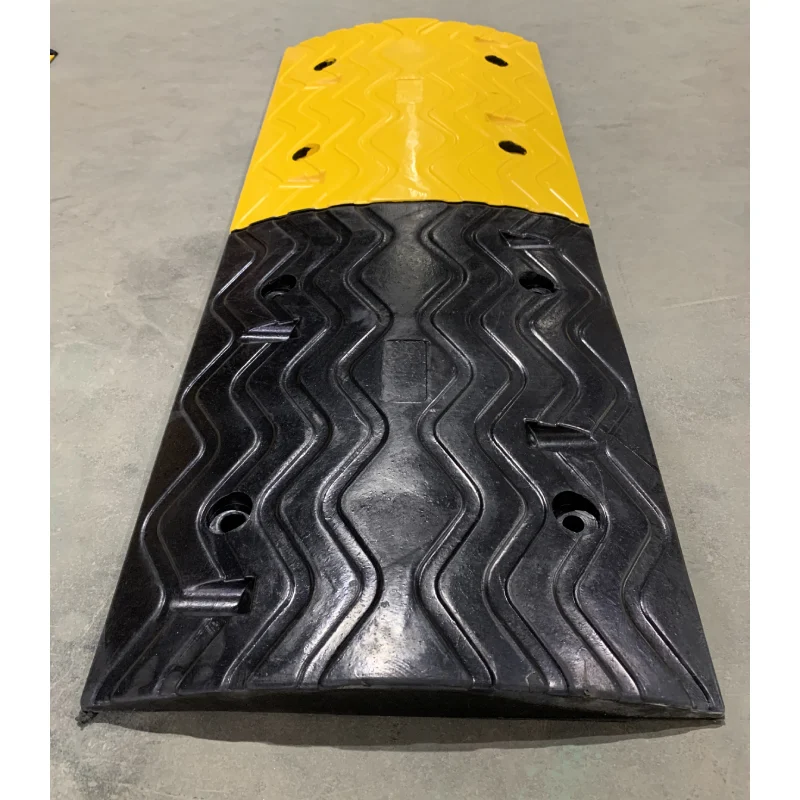 black and yellow rubber speed bumps