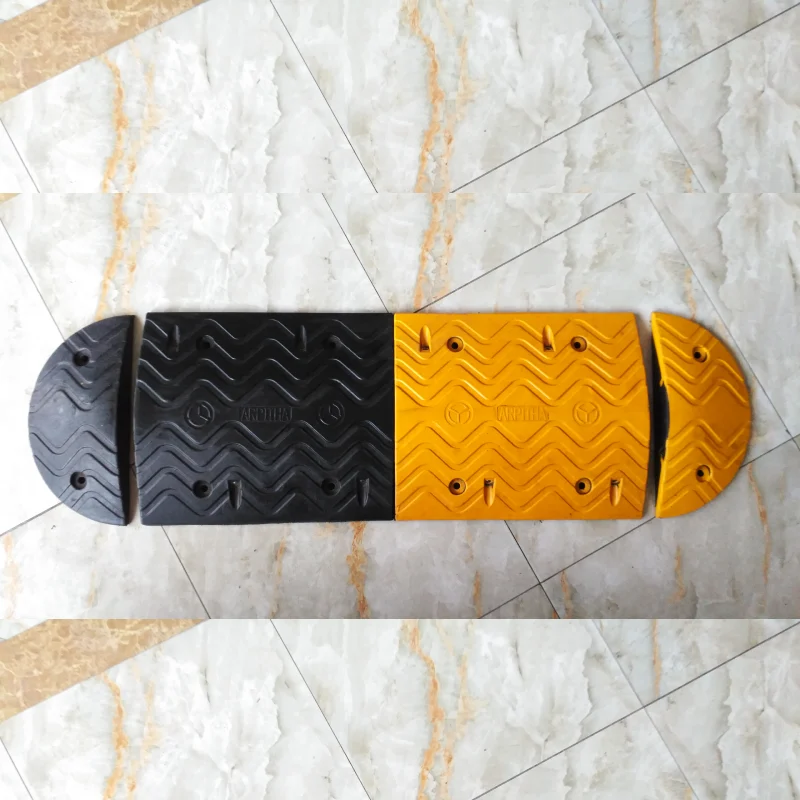 yellow-and-black speed bumps